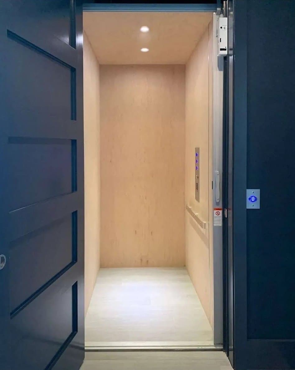 A Universal Lifts elevator cab with the door open